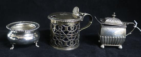 A Victorian silver mustard pot, a later silver mustard pot and a silver salt.